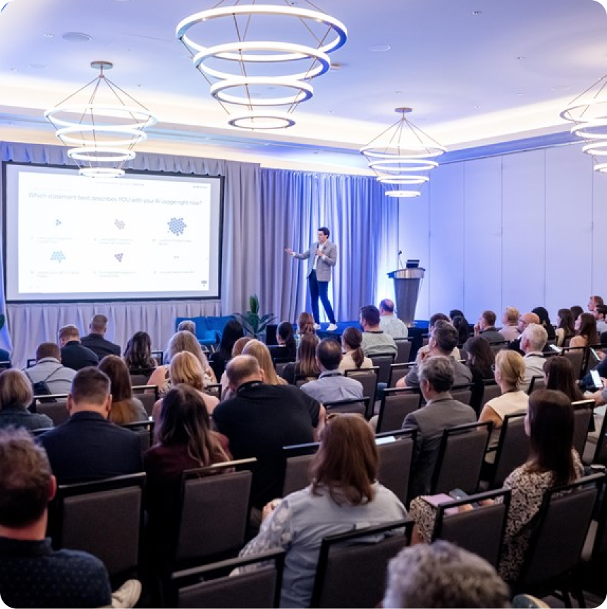 B2B NEXT AI summit audience watching a session