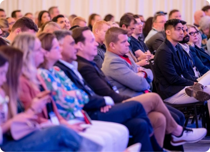 Attendees seated and engaged during a session at B2B NEXT AI