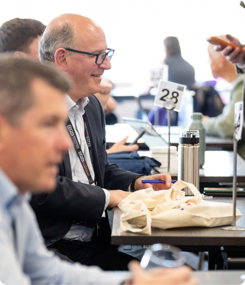 Senior B2B executives in a live working session at B2B NEXT AI